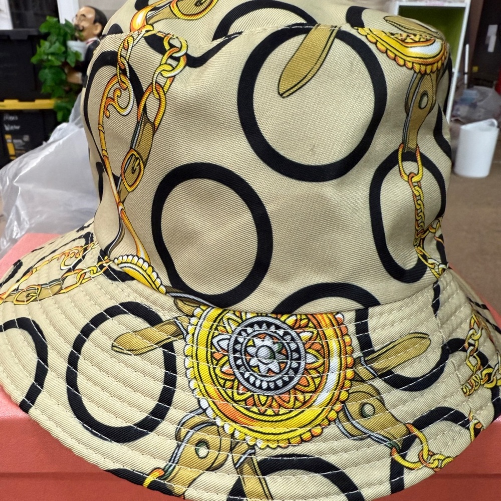 Beige Printed Bucket Hat with Black Circle & Gold Chain Motif
